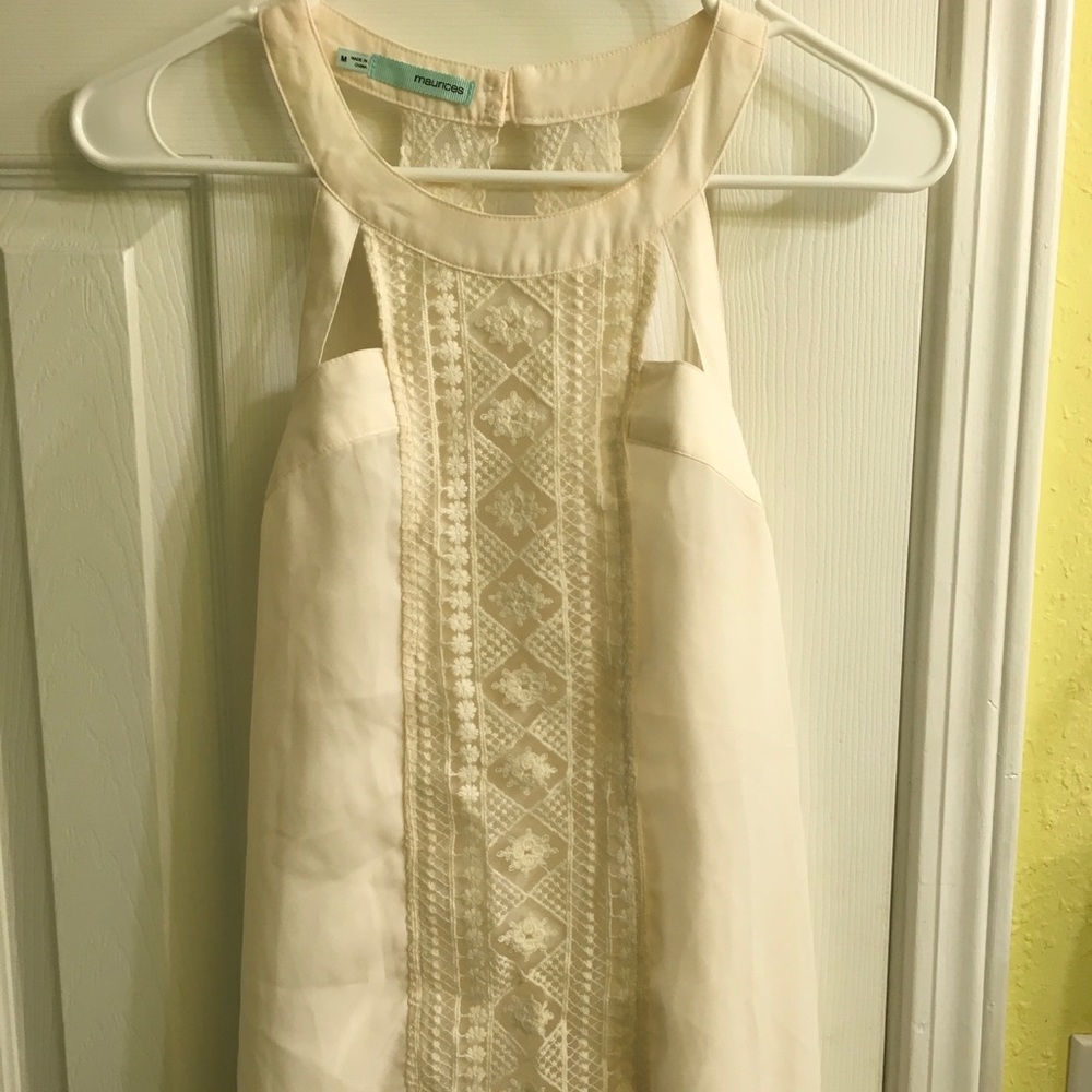 Off white sleeveless blouse